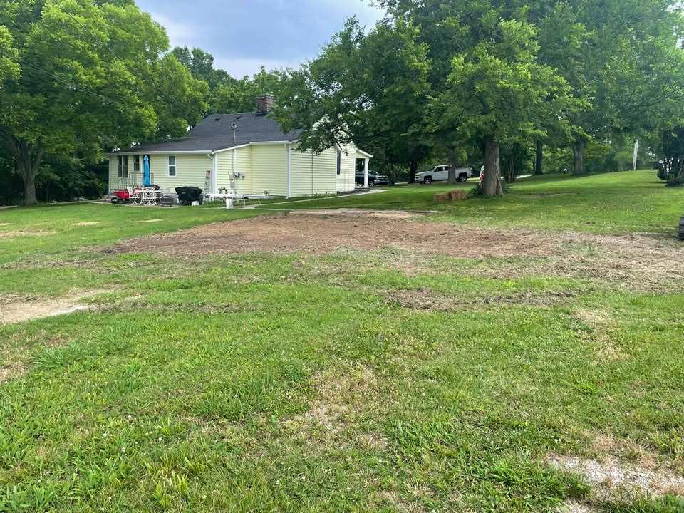 Placeholder after photo for detached garage demolition — replace with your own project photo.