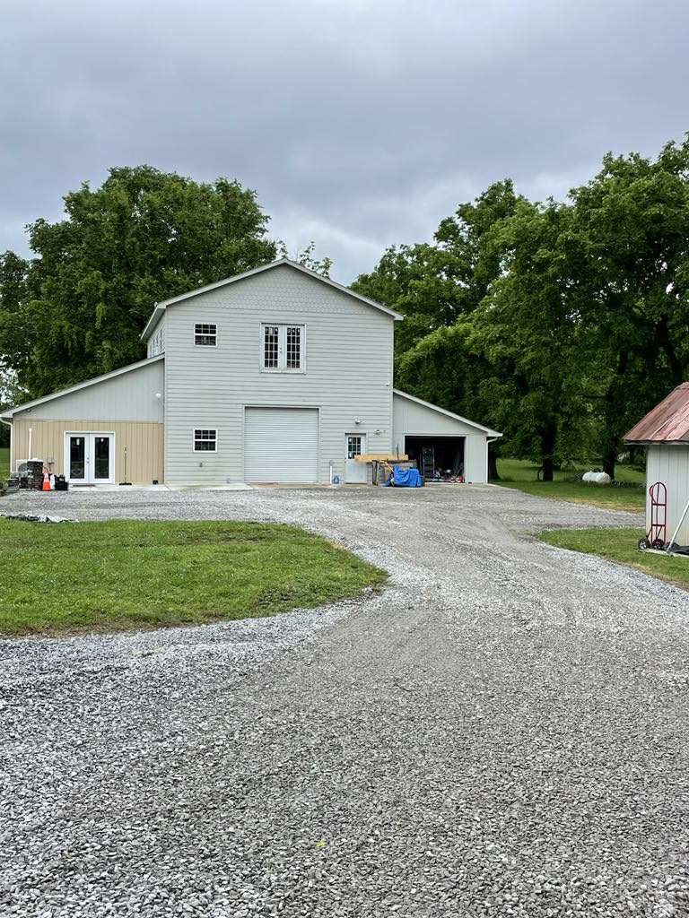 Placeholder after photo for drainage and parking lot install — replace with your own project photo.