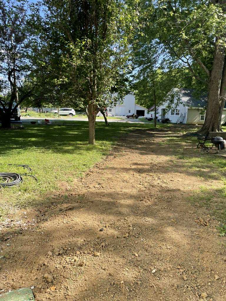 Placeholder after photo for new water line install — replace with your own project photo.