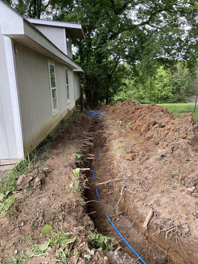 Placeholder before photo for new water line install — replace with your own project photo.